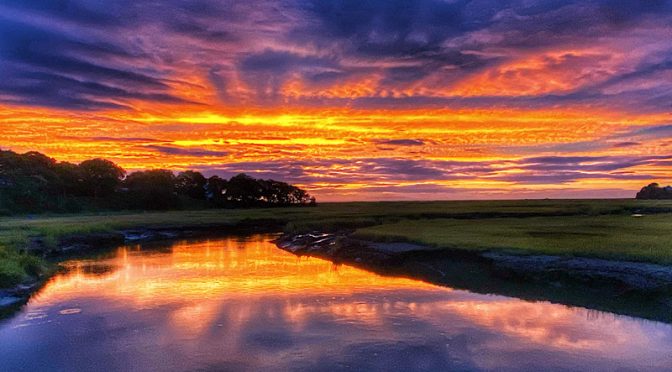 Spectacular Sunset Over Boat Meadow Creek On Cape Cod.